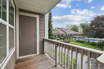 Private balcony overlooking community pool area